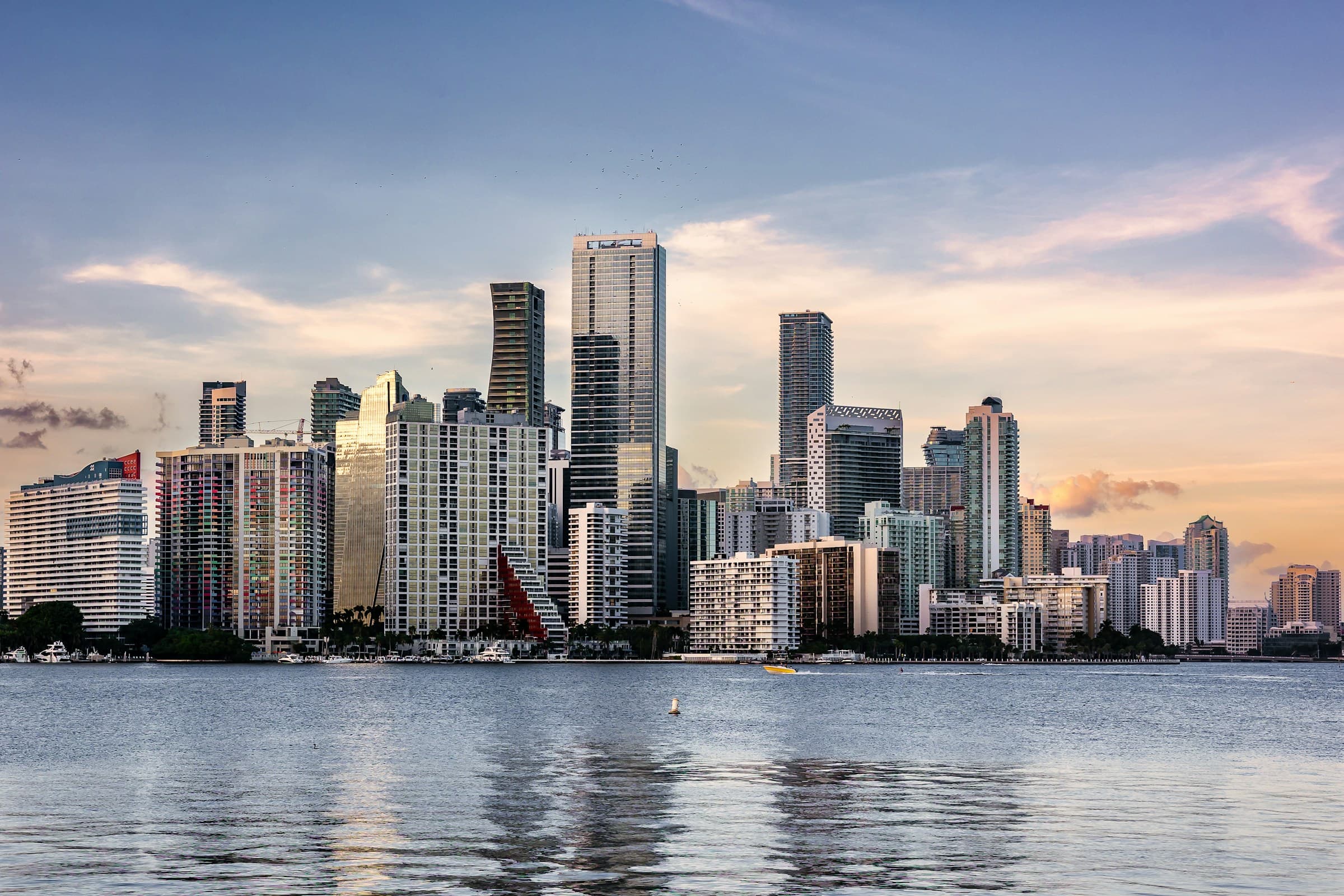 Miami skyline across Biscayne Bay at sunset